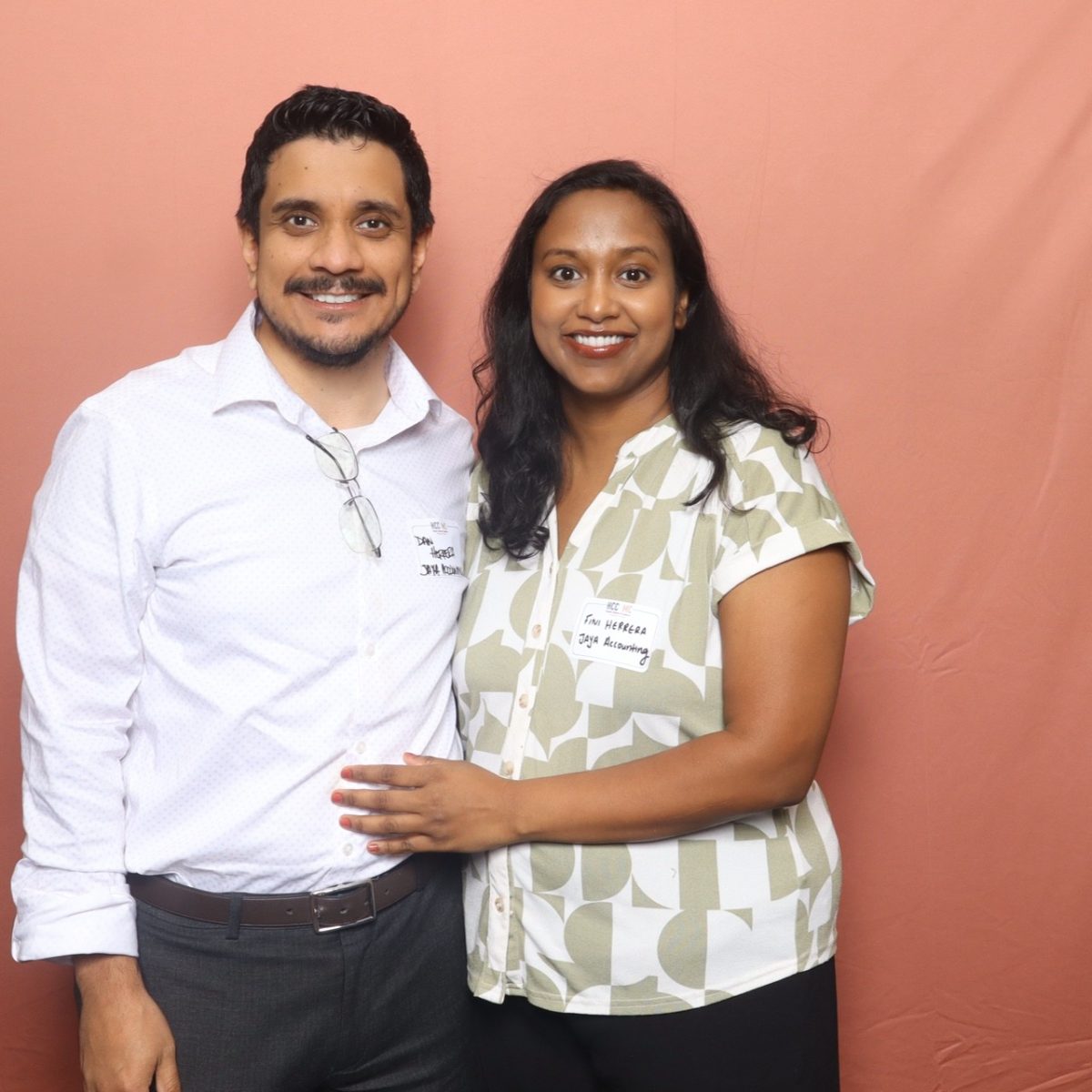 Dan and Fini Herrera smiling together at a community event
